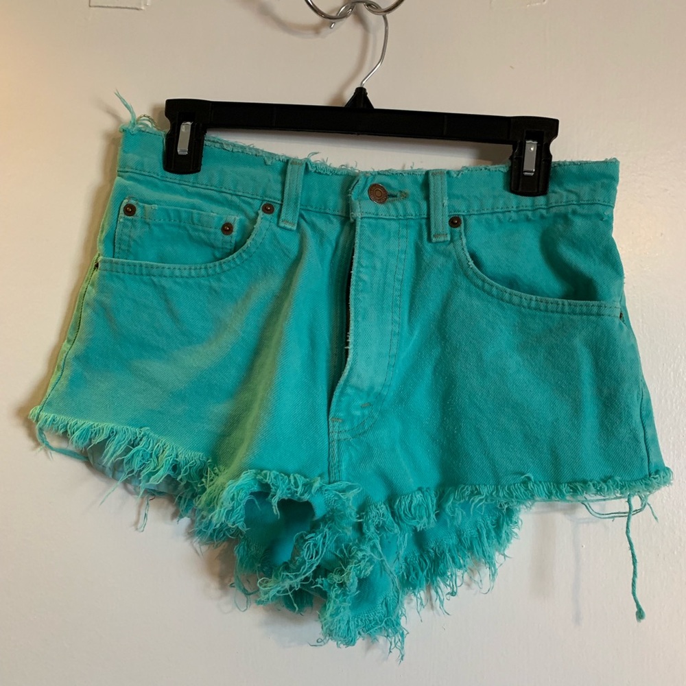 Levi’s distressed green shorts
